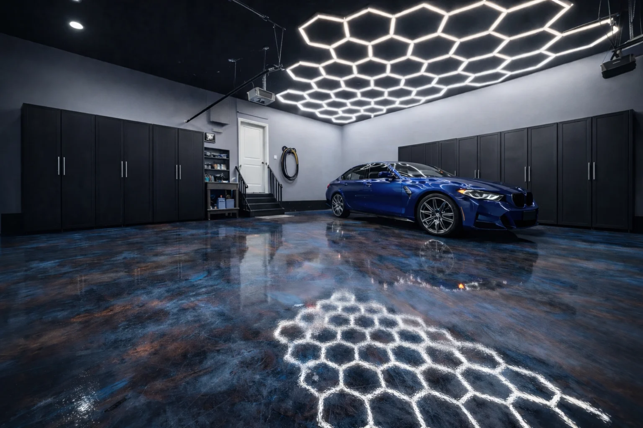Powered garage ceiling lift and overhead storage